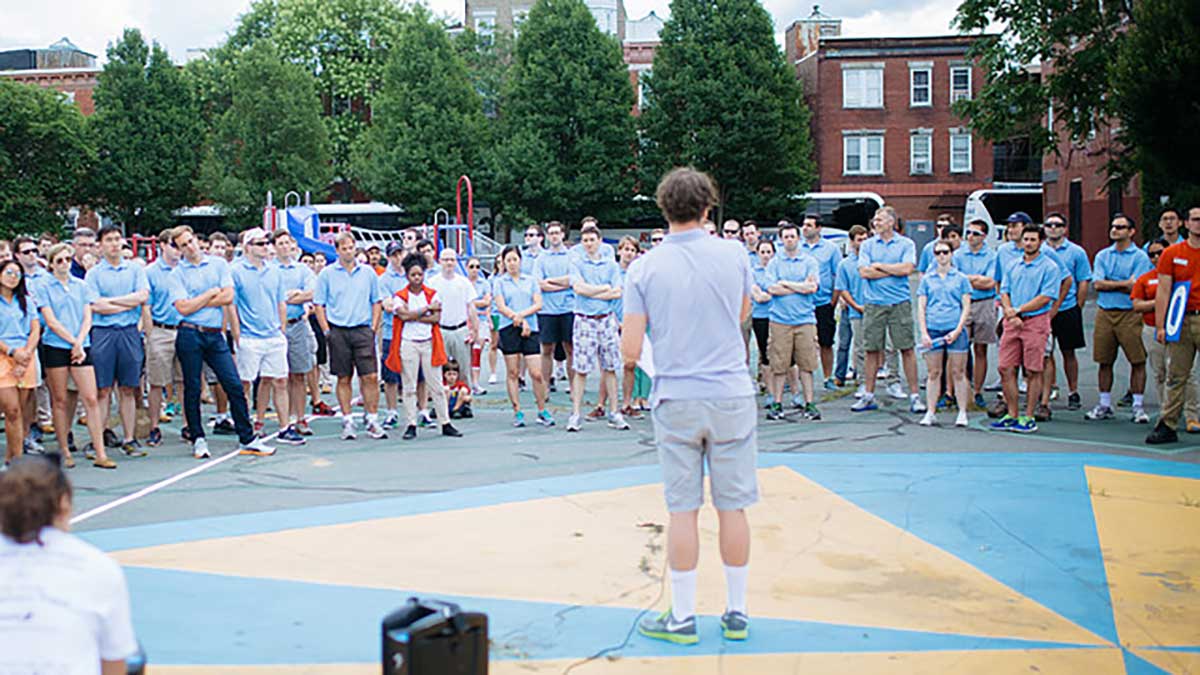 160 Blue blood AI Credit employees join City Year at the McKay School in East Boston for a day of service